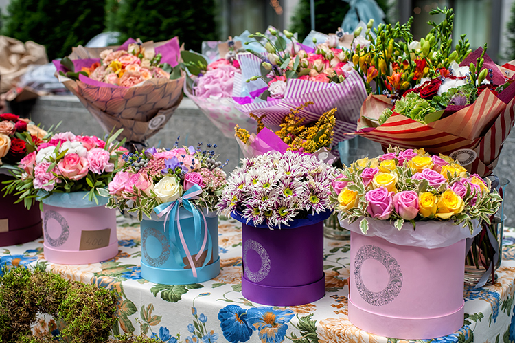Colorful floral bouquets in box for spring fundraising